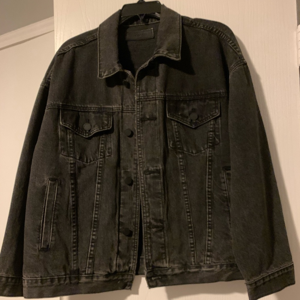 Jeans jacket . black fade color.over medium size.